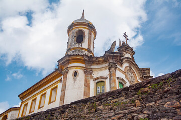 Fototapeta premium Baroque Church in Ouro Preto, Minas Gerais, Brazil. Igreja de Sao Francisco. Low angle view from religious building. Catholic architecture from de 18 century.