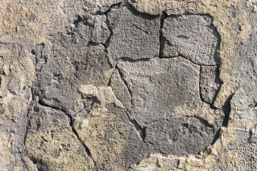 background image of a cracked concrete wall, close-up