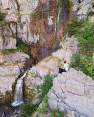 Aerial picture of man overlooking Stewart Falls
