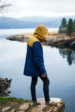 Boy looking over the Columbia River in November