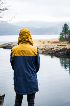 Boy looking over the Columbia River in November