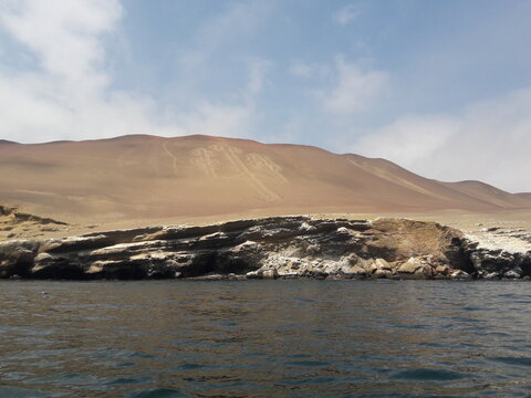 Paracas Peru carvings on side of mountain 2019
