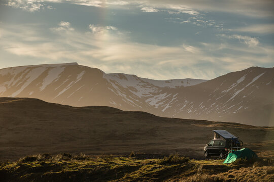 Highlands of Scotland - someone found a lovely spot for tonight - camper and a tent in a splendid landscape