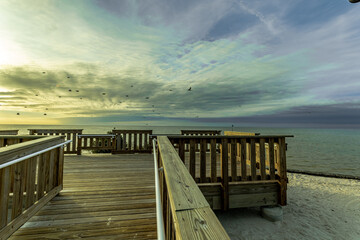 wooden pier at sunset