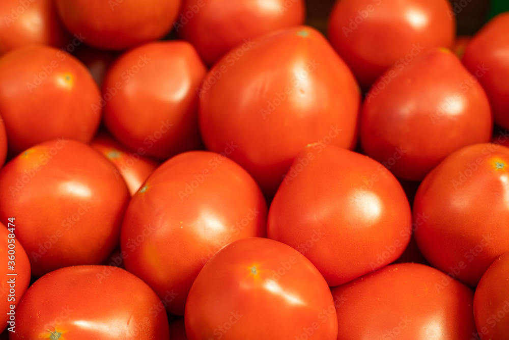 Wall mural red tomatoes background. Group of tomatoes