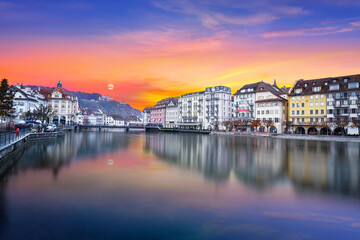 River Reuss side swiss city of Lucerne and twilight sunset