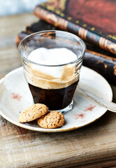Coffee with milk on rustic wooden background.	