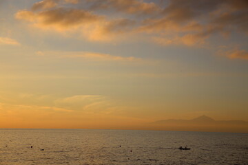 kayaking at sunset with a volcano in the background, Teide, Canary Islands