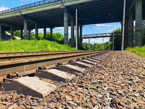 Railway tracks in countryside. Railway on sunny summer day.