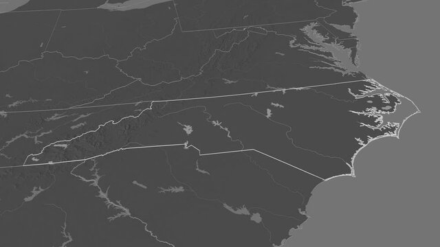 North Carolina, state with its capital, zoomed and extruded on the bilevel map of United States in the conformal Stereographic projection. Animation 3D