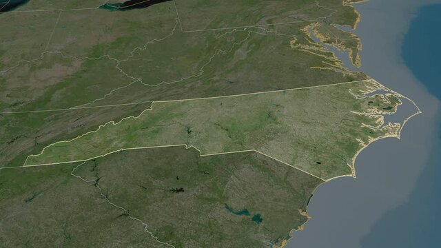 North Carolina, state with its capital, zoomed and extruded on the satellite map of United States in the conformal Stereographic projection. Animation 3D