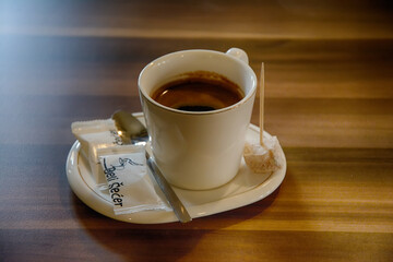 cup of coffee on wooden table
