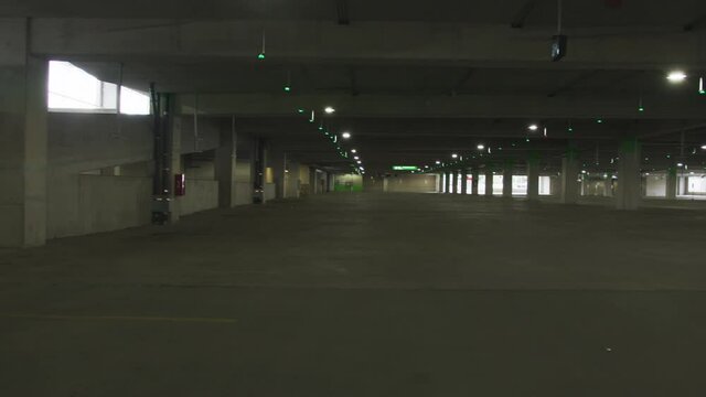 High quality 4k video of an empty parking lot due to mass lockdown in the city. Covid effects and business lockdown. Everyone working from home. Go station parking lot in Canada.