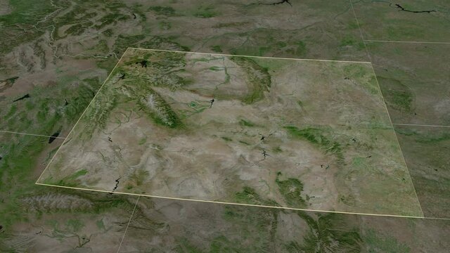 Wyoming, state with its capital, zoomed and extruded on the satellite map of United States in the conformal Stereographic projection. Animation 3D