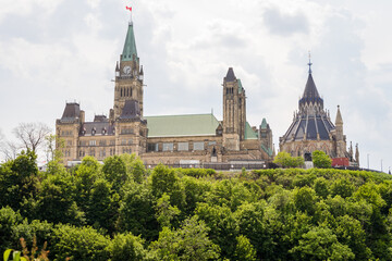 View of Canadian goverment building and flag in Ottawa