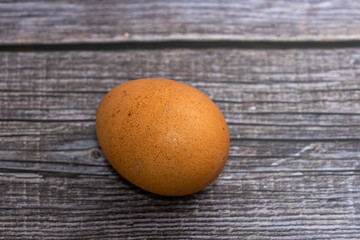 Whole chicken egg on a white background white table with egg.