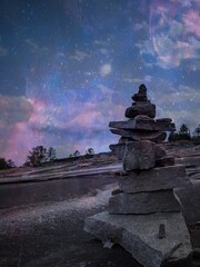 Balanced stones in celestial light
