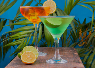 Summertime fruit cocktails,with a tropical background.