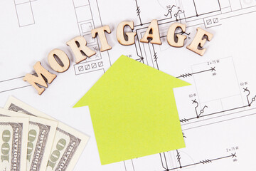 Inscription mortgage, dollar and home shape on electrical drawing, buying or building house concept
