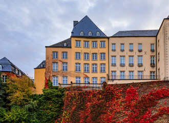 Fototapeta premium View of the old town of Luxembourg, UNESCO World Heritage Site, with its ancient wall and colorful leaves in the fall