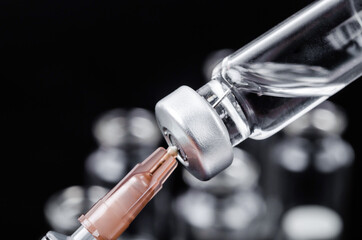 Vaccine and syringe injection.