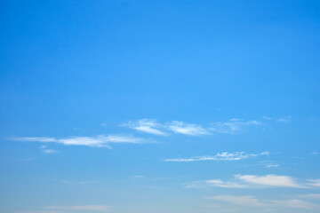 Fototapeta premium Clear Blue Sky with Small Clouds