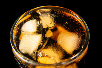 glass of cola with ice