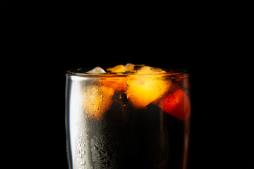 glass of cola with ice