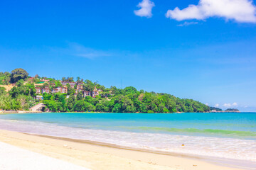 Fototapeta na wymiar Tropical beach with resort on the mountain at Patong Beach, Phuket, thailand.
