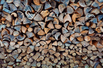 pile of wood log cut in piece for texture background