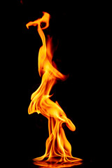 fire in the flames on black background