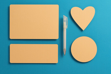 Flat lay mockup greeting card with pen and envelope