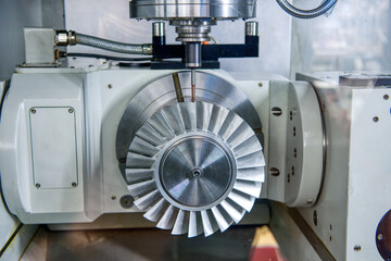 CNC metal cutting machine makes turbine wheel