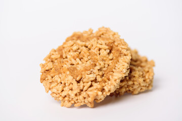 Deep fried sweet crispy rice with cane sugar drizzle, Local Thai snack (Khao Tan)