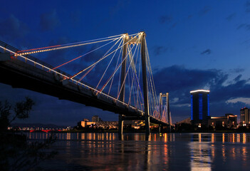 Fototapeta premium Vinogradovsy bridge in Krasnoyarsk. Yenisei River. Night