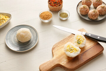 Traditional Japanese onigiri with spices on table