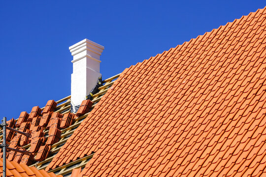 Restoration Of A Historic Wooden House And Replacement Of Roof Clay Tiles