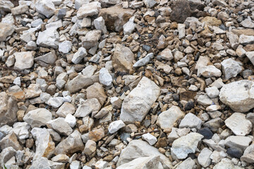 Photo of the texture of broken stone or rubble.