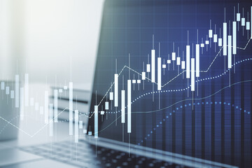 Double exposure of abstract creative financial chart on modern laptop background, research and strategy concept
