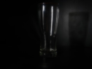 Empty  glass isolated on black background