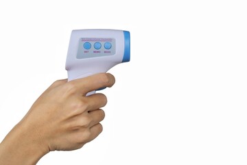 Staff hand hold non contact infrared thermometer on pure isolated white background with copy space. Concept of protect Covid flu. Control people to enter shopping mall, supermarket, canteen, office.