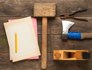 carpenter tools in pine wood table