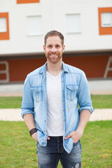 Casual guy with a denim shirt relaxed