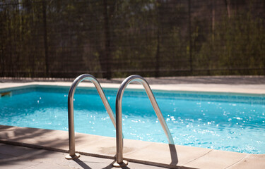 Obraz na płótnie Canvas Swimming pool in the sun