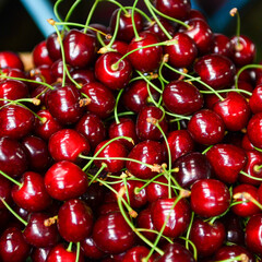 Cherries are sold on the counter in the bazaar.