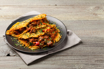 Hungarian potato pancake with goulash