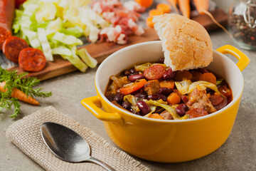 Traditional portuguese goulash with cabbage, beans and ribs.