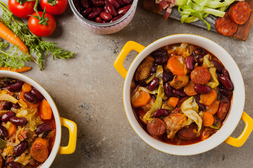 Traditional portuguese goulash with cabbage, beans and ribs.