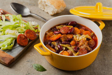 Traditional portuguese goulash with cabbage, beans and ribs.