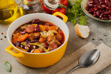 Traditional portuguese goulash with cabbage, beans and ribs.